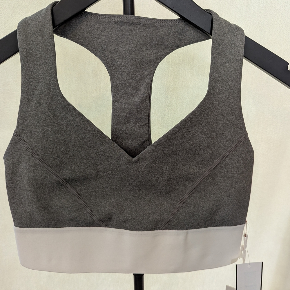 Good American Charcoal and Cream Sports Bra
